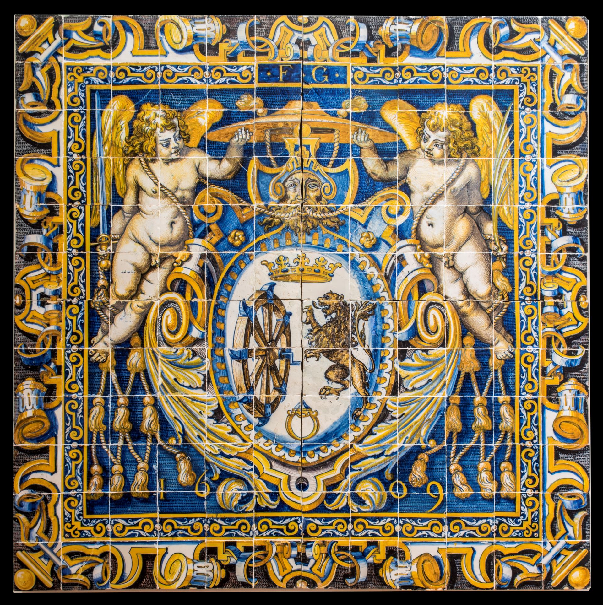 Panel de azulejos con escudo de Santa Catalina, 1609.                   Ubicación: nave central del liceo del Museo Ruiz de Luna.Talavera de la Reina (Toledo)